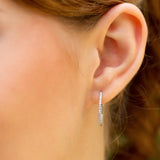 Ces splendides boucles d'oreilles ne passeront pas inaperçu. Elles sont signées de la Ligne Vendôme, des pièces de haute joaillerie très élégantes et féminines qui subliment les femmes. Ces boucles d'oreilles sont pavées de Diamants à l'extérieur et à l'intérieur également de la créoles. Elles seront parfaites à porter pour vos grands évènement, ou même au quotidien grâce à leur design intemporel.