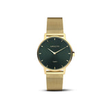 La montre Odette, avec son boîtier en or jaune et son cadran à motif soleil vert foncé, est faite pour ceux qui souhaitent se démarquer par leur élégance unique et leur originalité.