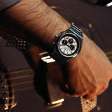 Citizen CA4610‑85A – chronographe homme Super Titanium Eco‑Drive, cadran argent, verre saphir, chronographe, date et 100 m étanche. Montre élégante et durable.