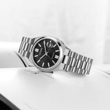 Citizen NJ015081E – montre homme automatique 40 mm acier, cadran noir, bracelet acier, guichet date, verre saphir et étanchéité 50 m. Élégance sobre & fiable