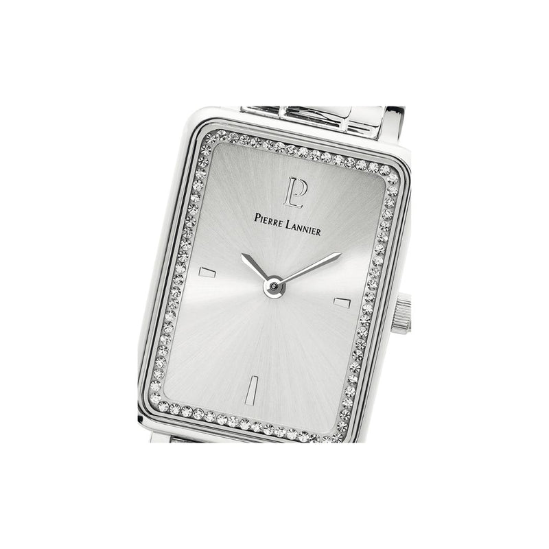 Montre femme Pierre Lannier Ariane 073H621. Cadran argenté et bracelet en acier brillant, avec lunette délicatement ornée de cristaux pour une touche d'élégance. Fabriquée en France, elle est disponible chez Maison Goget, Route de Laval, Sablé-sur-Sarthe.