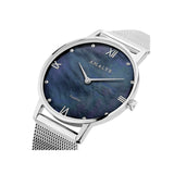 la montre Aurore, tout en argent et son cadran bleu nacré aux reflets subtils, est définitivement l'accessoire à avoir pour compléter son look.