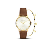Découvrez Giftbox Léonie, le coffret cadeau parfait pour femme, composé d’une montre élégante et d’un bracelet bijou assorti. Un duo chic pour sublimer votre poignet et marquer les esprits.
