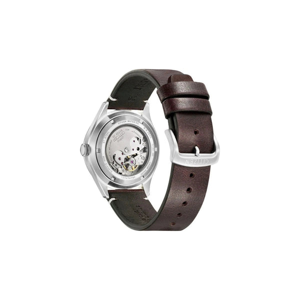 Citizen NH8390‑03XC – montre homme automatique 40 mm acier, cadran vert, bracelet cuir, affichage jour/date, étanche 50 m. Style classique et élégant.